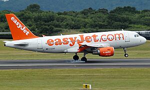 EasyJet A319-111 (G-EZAO) landing at Manchester Airport (1)