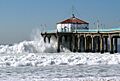 Huge surf strikes the Manhattan Beach Pier during the biggest storm of Winter 2007-2008