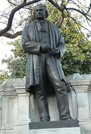 Bronze statue of Victorian man standing