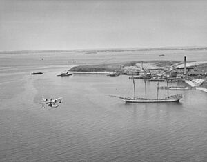 OS2U Kingfisher from VS1D1, NAS Squantum flying near Spectacle Island, April-May 1942 NARA 80-G-6838