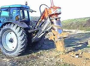 Rotor stump remover recover a tree roots for a biomass central.