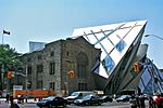Exterior facade of the Royal Ontario Museum from across the intersection of Bloor Street and Avenue Road