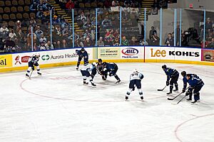 Cleveland Monsters vs. Milwaukee Admirals December 2024 04 (face-off)