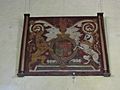 Photograph of King Charles I's arms, painted on wall of St Botolph's Church in Botolph, West Sussex, England