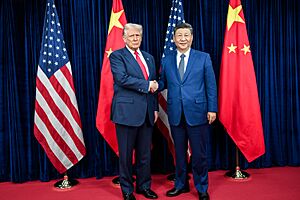 President Donald Trump greets Chinese President Xi Jinping before a bilateral meeting at the Gimhae International Airport terminal (54890669668)
