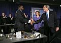 President George W. Bush greets Detroit Mayor Kwame Kilpatrick