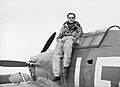 Squadron Leader Douglas Bader, CO of No. 242 Squadron, seated on his Hawker Hurricane at Duxford, September 1940. CH1406