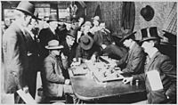 "Orient Saloon at Bisbee, Arizona... Faro game in full blast. Recognized, Left to right-Tony Downs (standing with derby) - NARA - 530986