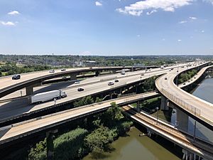 2019-07-15 13 34 07 View south along Interstate 395 (Cal Ripken Way) at its junction with Interstate 95 from the overpass for the ramp from Interstate 395 southbound to Interstate 95 northbound in Baltimore City, Maryland