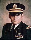 A color image showing 2nd Lieutenant Gary M. Rose from the chest up in his military uniform with ribbons.