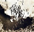 Bombs from a B-17 Flying Fortress falling on Monserrato Airfield near Cagliari, Sardinia, 1943 (26683983423)