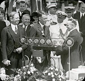 Charles Lindbergh receiving the Distinguished Flying Cross from President Calvin Coolidge