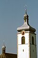 Dettaglio del campanile della Pfarrkirche Sankt Laurentius und Gallus