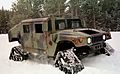 Humvee equipped with four snow treads