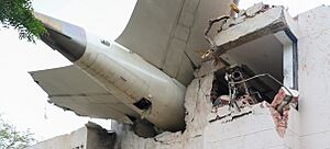 Prime Minister of Bharat, Shri Narendra Damodardas Modi looks on at the wreckage of the crashed Air India Flight 171 (cropped)