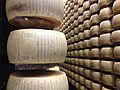 Unapproved Parmigiano-Reggiano wheel on shelf