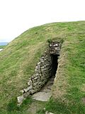 Unstan chambered cairn entrance by Bruce McAdam.jpg