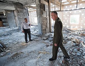 160801-D-PB383-016 US-General Joseph F. Dunford Jr. tours parts of the Turkish Grand National Assembly that were destroyed during the failed July 15 coup in Ankara