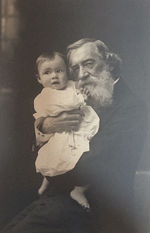 Moncure D. Conway holding a baby
