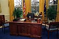 Photograph of Socks the Cat Sitting Behind the President's Desk in the Oval Office- 01-07-1994 (6461515323)