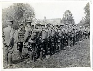 Platoon parading outside their billets (Photo 24-326)