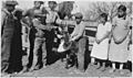 Students pose with calf during branding at Brave Heart Day School - NARA - 285477