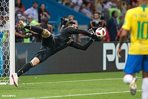 Belgium goalkeeper Thibaut Courtois making a save during the match against Brazil, 6 July 2018