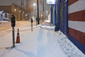 Deep Ellum sidewalk covered with snow in Dallas snow storm 2021