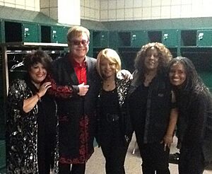 Elton John with his singers Tata Vega, Rose Stone, Jean Johnson Witherspoon, & Lisa Stone