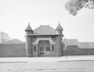 Black and white photograph of the wall and entrance of the Car Barn on Prospect Street