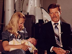 Seddon and Gibson with newborn baby Paul