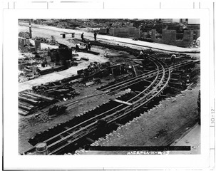 PULL CURVE RECONSTRUCTION- Photocopy of a September 1907 photograph showing the reconstruction of a pull curve at Sacramento and Larkin Streets following the earthquake and HAER CAL,38-SANFRA,137-13