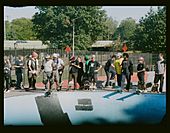 Skaters wait to drop in the bowl at Owl's Head Skate Park - October 2019