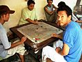 Tiibetans playing carrom in Delhi