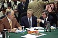 Ahmed Chalabi in discussion with Paul Bremer and Donald Rumsfeld
