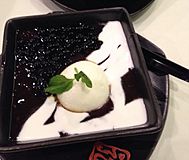 Black glutinous rice porridge served with ice-cream at a Hong Kong dessert shop