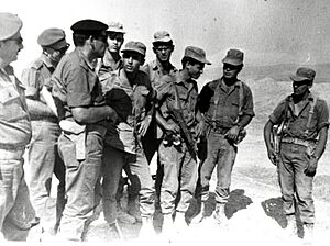 C.O. OF CENTRAL COMMAND RECHAVAM ZEEVI AND SERGEANT SHAUL MOFAZ (AT HIS RIGHT), AFTER A PURSUIT IN THE JORDAN RIFT