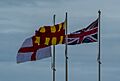 English Border flags on the A1 at Marshall Meadows Bay (cropped)