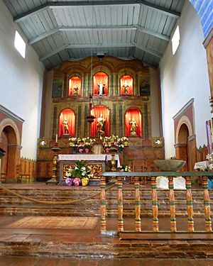 Mission San Juan Bautista (SJB, CA) - church interior, sanctuary decorated for Easter