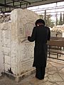 Praying at Belzer Rebbe's grave