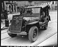 SC 196671 - Members of the 1st French Army, in the Mulhouse area, France, decorated this jeep with a captured picture of Hitler. To further show their sentiment for Adolf, they completed the picture by placing a chain around his neck