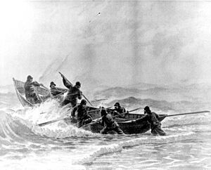 A Life-Saving crew launches a surfboat through heavy surf. Courtesy of U.S. Coast Guard Historian’s office