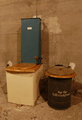 Dry toilet with peat dispenser (Torfstreu-Trockenklosett in German) on display in a former bunker in Berlin