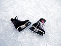 Ice hockey skates on ice