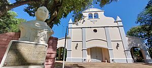 Church in Itape behind the sculpture of its founder Buenaventura de Villasboa