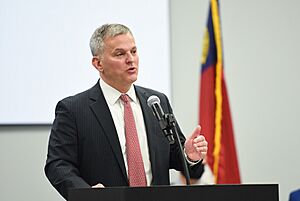 Josh Stein speaking at DMV License and Theft event (cropped)