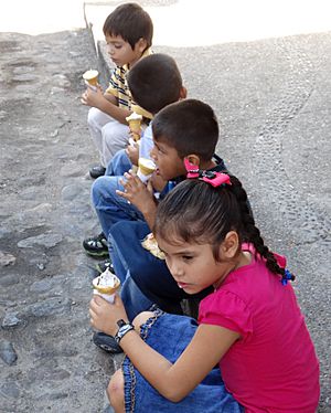 Kids Eat Ice Cream on Sidewalk - Puerto Vallarta - Jalisco - Mexico (11347852413)