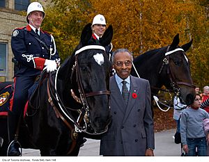 Lincoln Alexander with police horses at the Royal Winter Fair