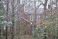 Oak Lawn in Charlottesville, through trees