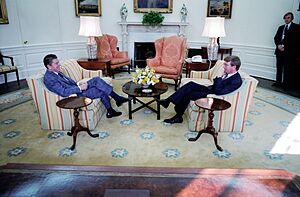 President Ronald Reagan in the Oval Office during an interview with George Will